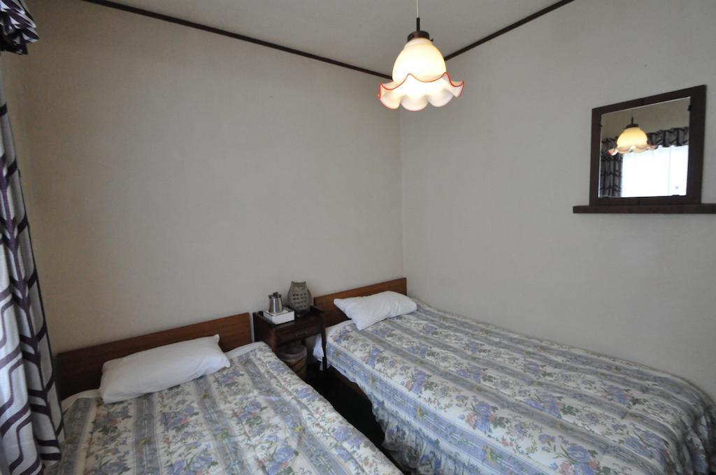 Guest House Wind Inn Hakuba Szoba fotó
